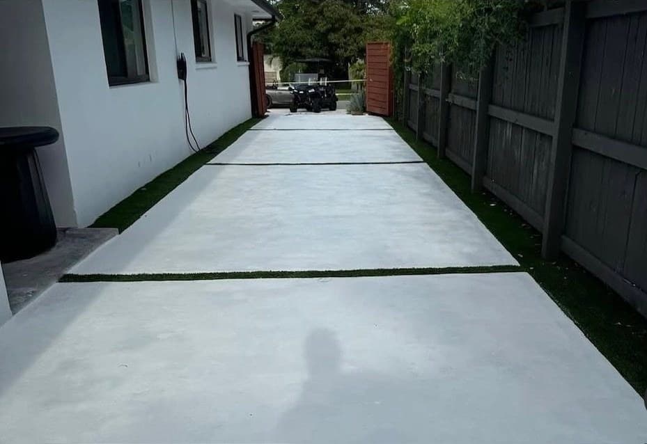 Freshly pressure-washed concrete walkway, bright and spotless